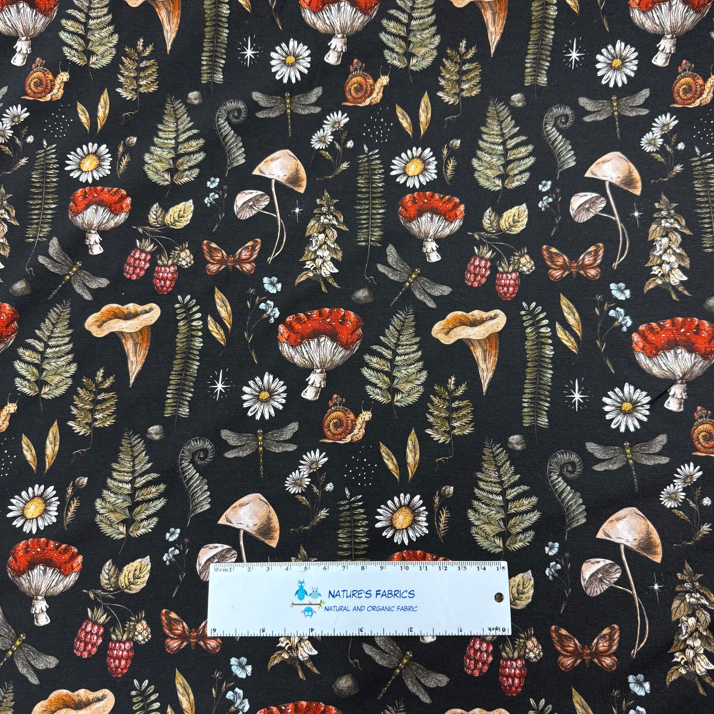 Flora and Fauna on Black Bamboo/Spandex Jersey Fabric