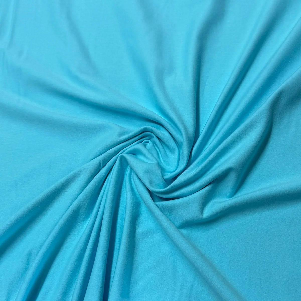 Turquoise organic cotton fabric swirled for texture, Nature's Fabrics