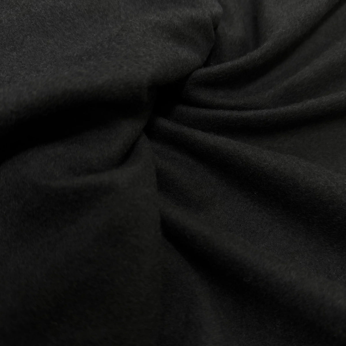 Black organic cotton fabric by Nature's Fabrics, soft texture for sewing and crafts