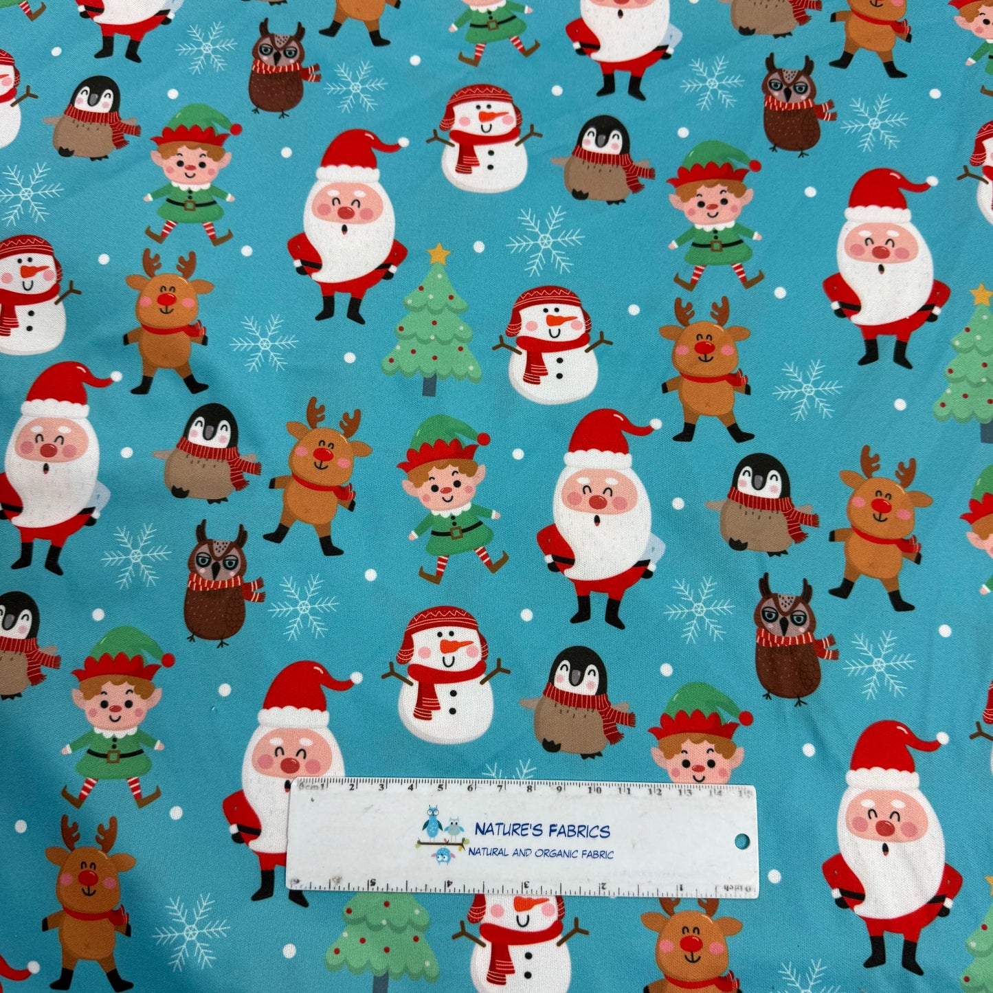 Santa and Friends on Blue 1 mil PUL Fabric - Made in China- Seconds