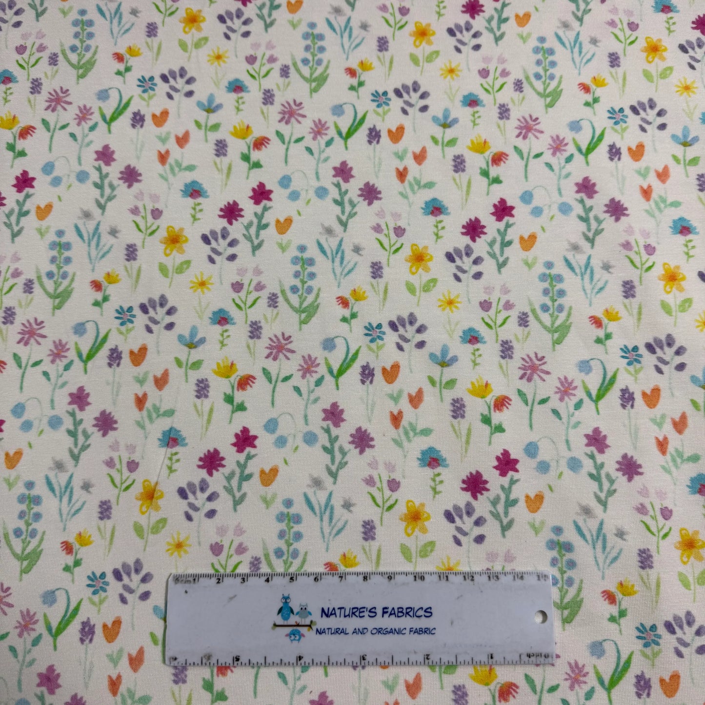 Pastel Dainty Flowers on Off White Bamboo/Spandex Jersey Fabric - Printed in the USA
