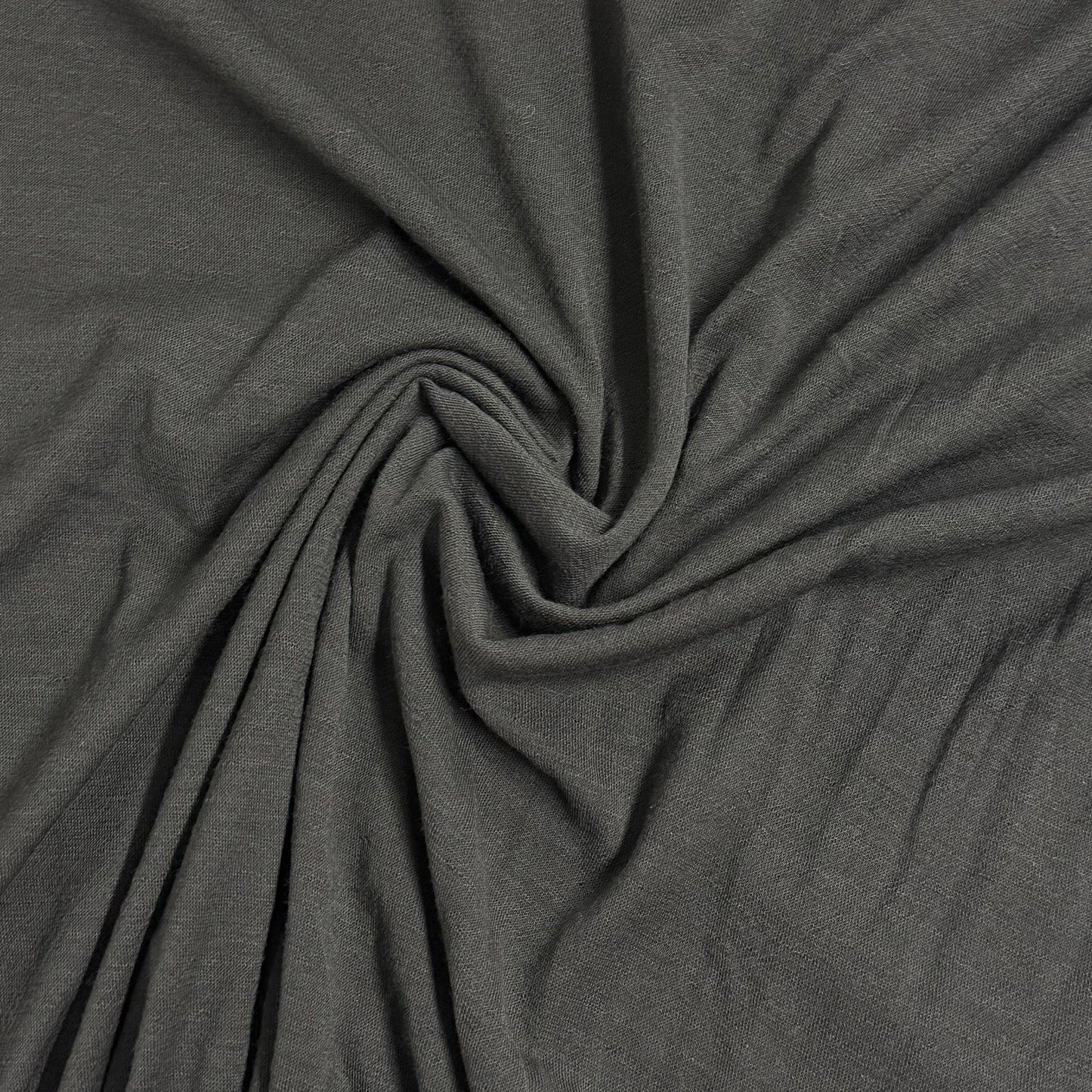Charcoal gray organic cotton fabric swirled texture by Nature's Fabrics