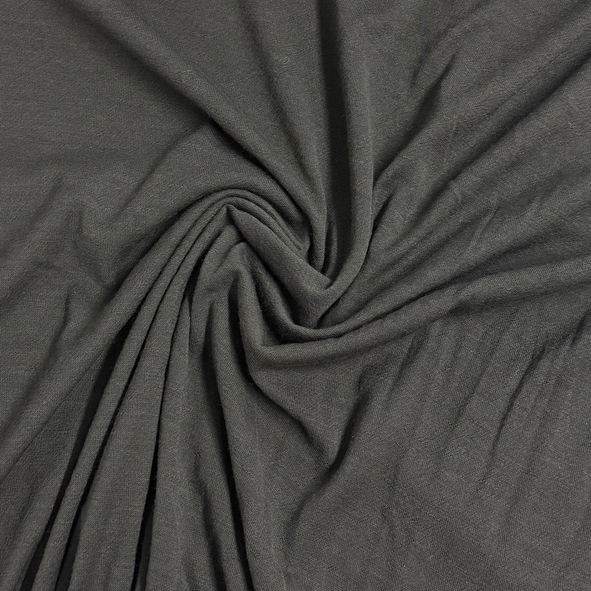 Charcoal gray organic cotton fabric swirled texture by Nature's Fabrics
