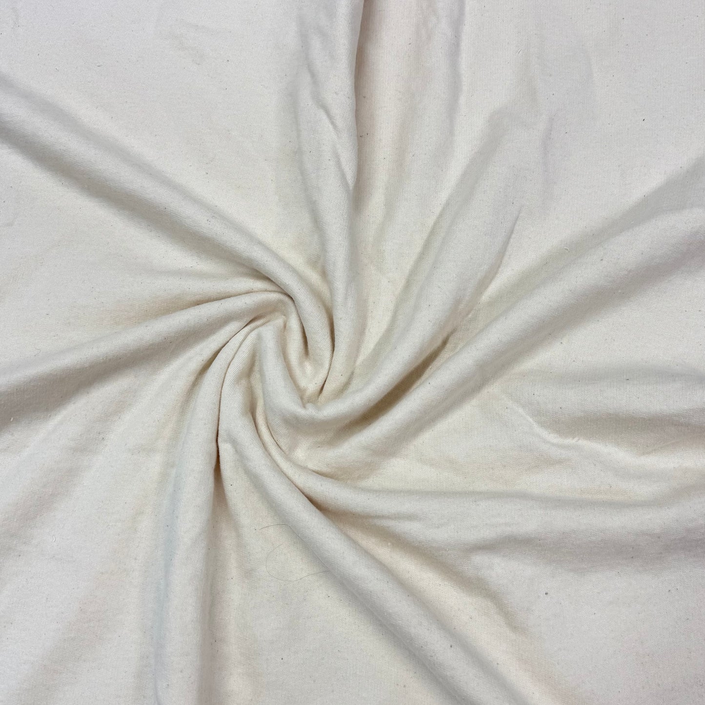 Nature's Fabrics organic cotton fabric swirled texture, natural off-white by the yard