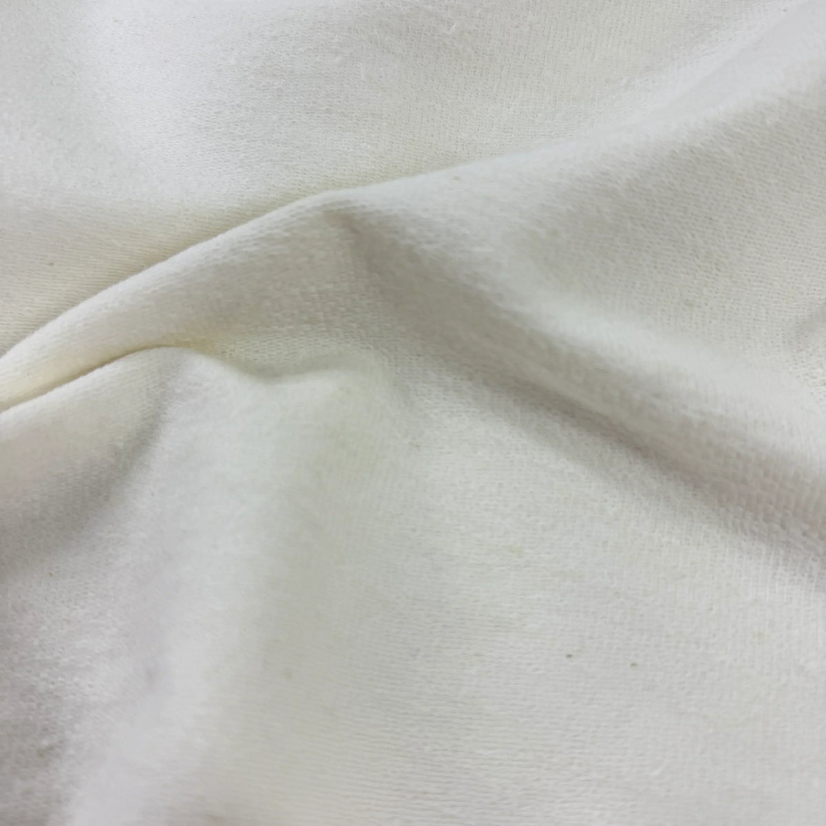 Close-up of white organic cotton fabric from Nature's Fabrics