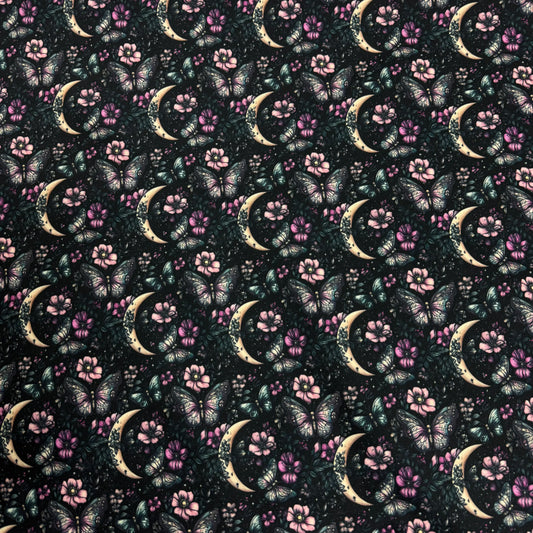 Nature's Fabrics dark floral fabric with crescent moons and butterflies pattern