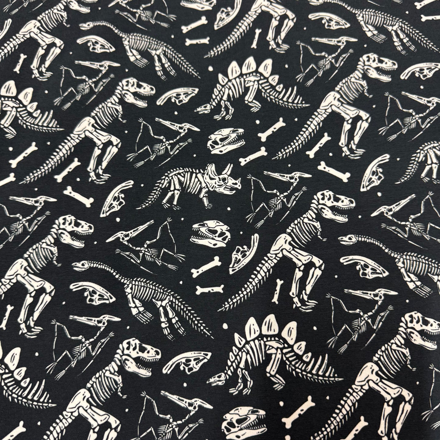 Dino Skeletons on Organic Cotton/Spandex Jersey Fabric