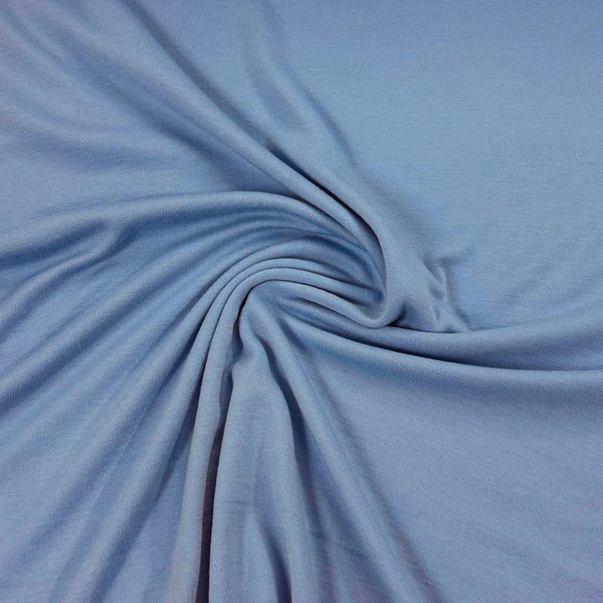 Soft blue organic cotton fabric swirled for texture — Nature's Fabrics