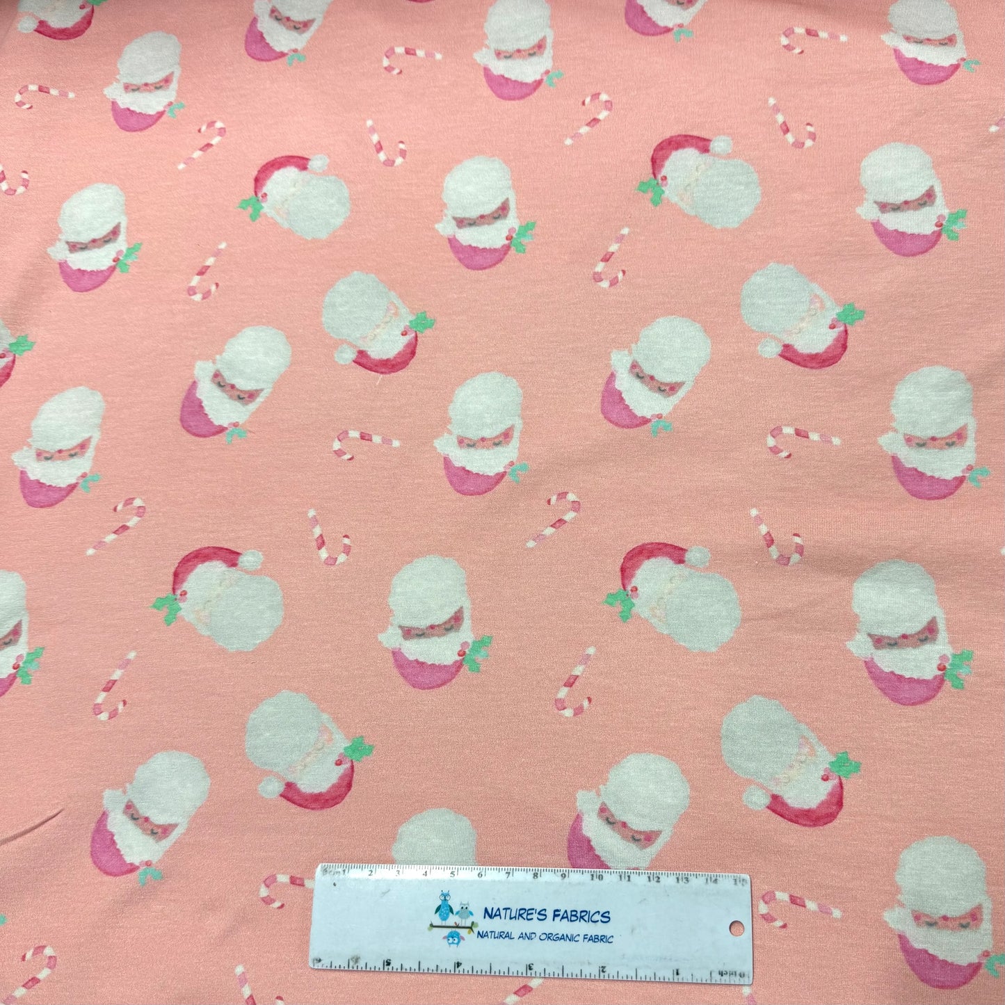 Santa on Peach Bamboo/Spandex Jersey Fabric- Printed in the USA
