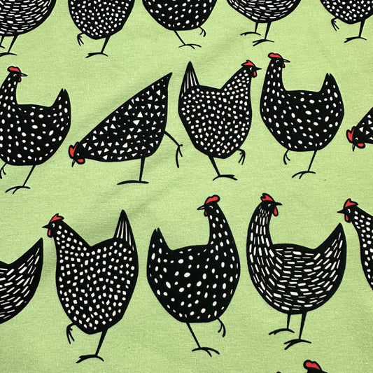 Black Chickens on Green Organic Cotton/Spandex Jersey Fabric