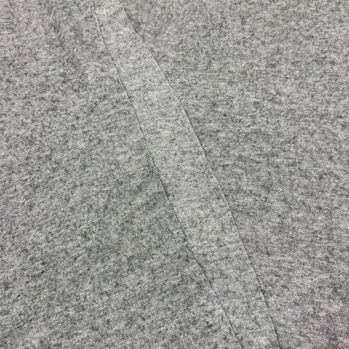 Gray heathered organic cotton fabric by Nature's Fabrics, ideal for eco-friendly sewing projects