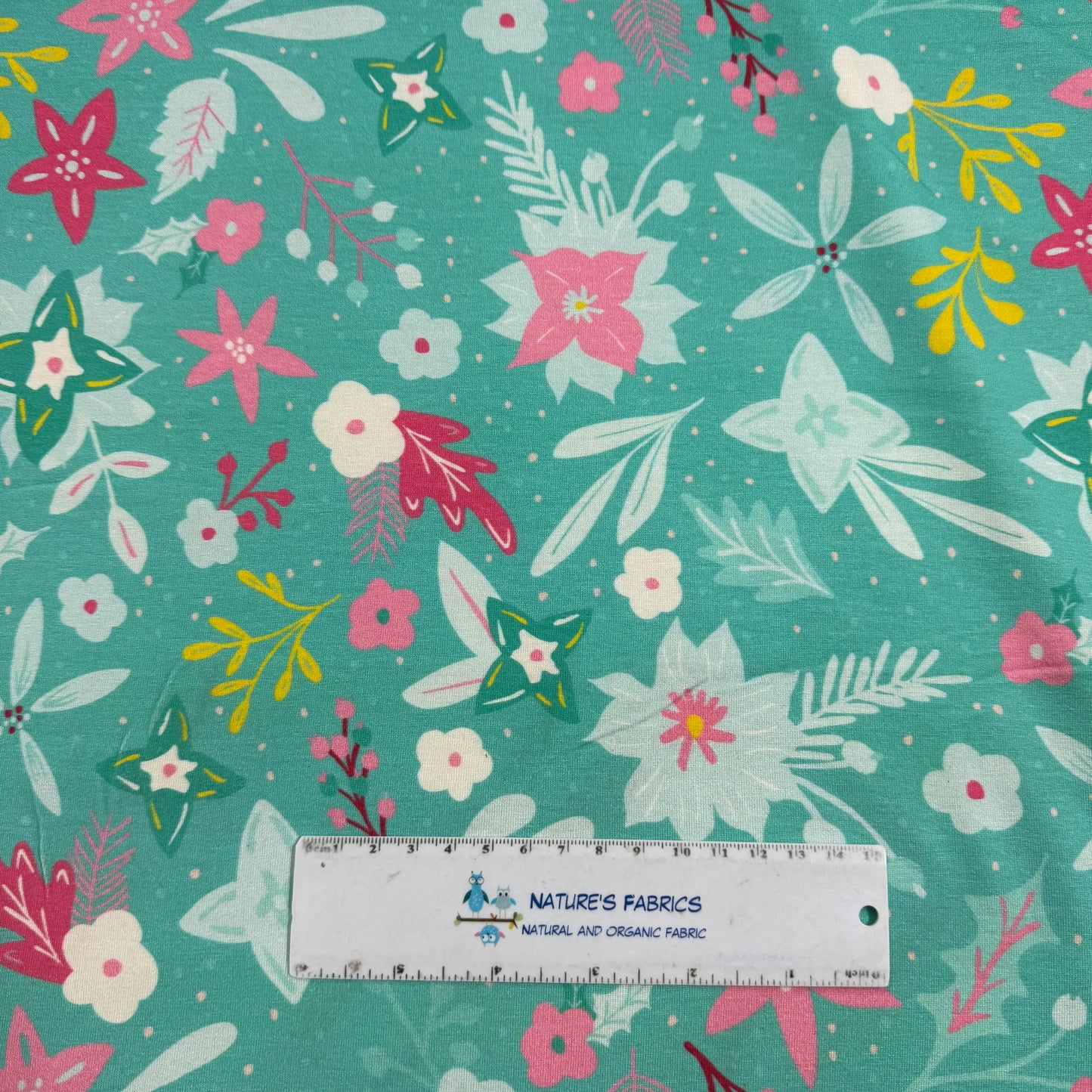 Winter Flowers on Teal Bamboo/Spandex Jersey Fabric - Printed in the USA