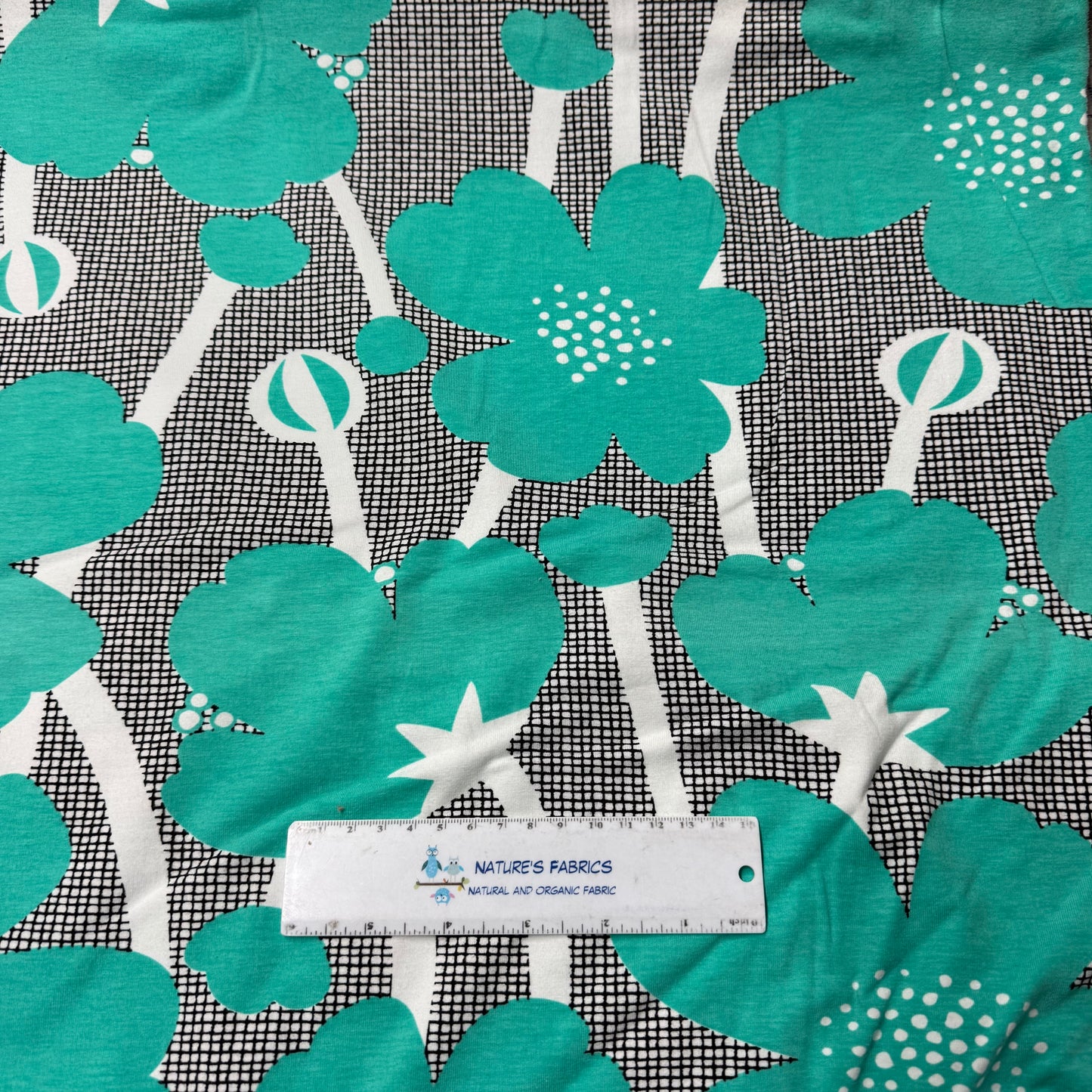 Turquoise Buttercups on Organic Cotton/Spandex Jersey Fabric