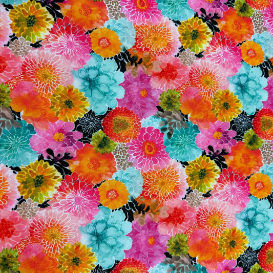 Nature's Fabrics colorful floral pattern fabric with vibrant multi-colored blossoms.