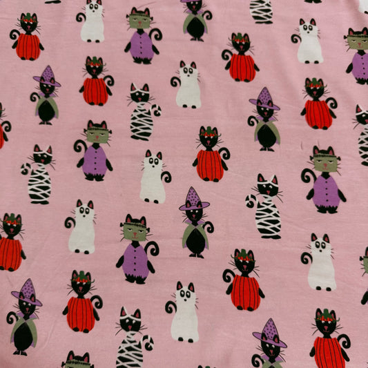Nature's Fabrics pink cotton fabric with cute cartoon Halloween cats pattern