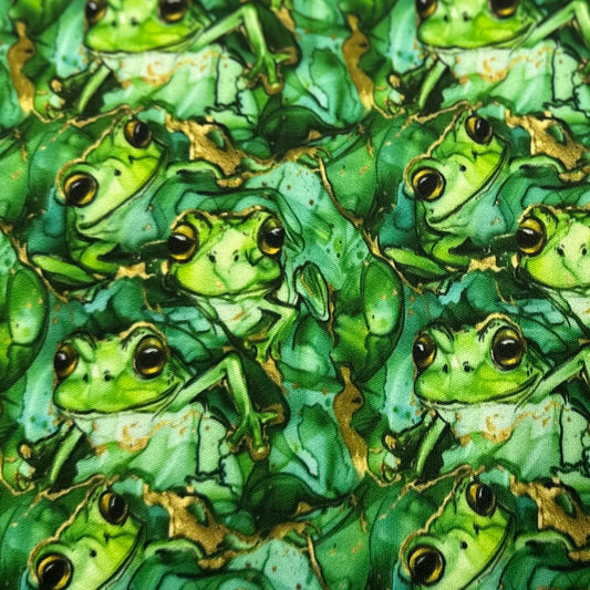Green frog pattern fabric by Nature's Fabrics with gold accents