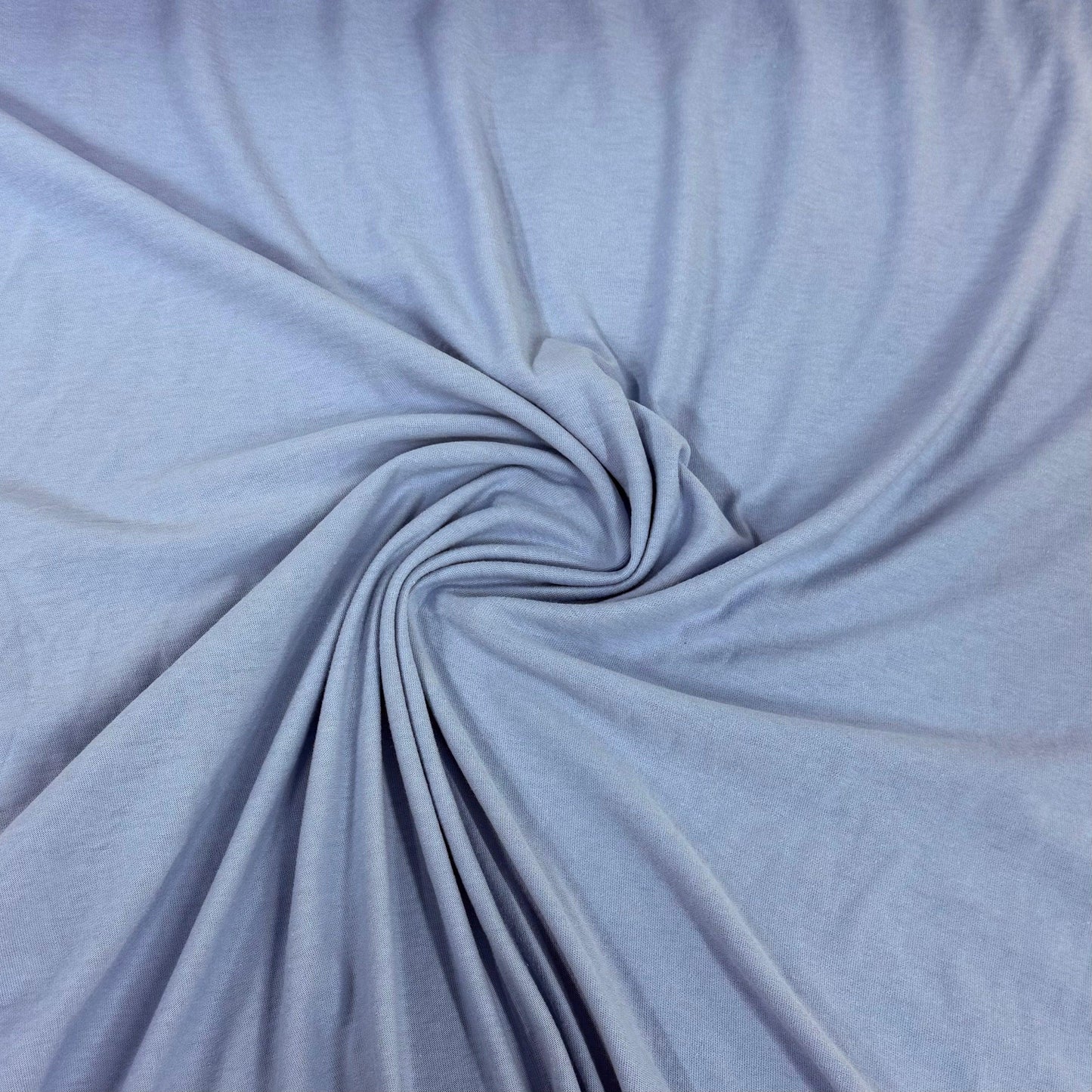 Soft light blue organic cotton fabric swirled for texture, Nature's Fabrics