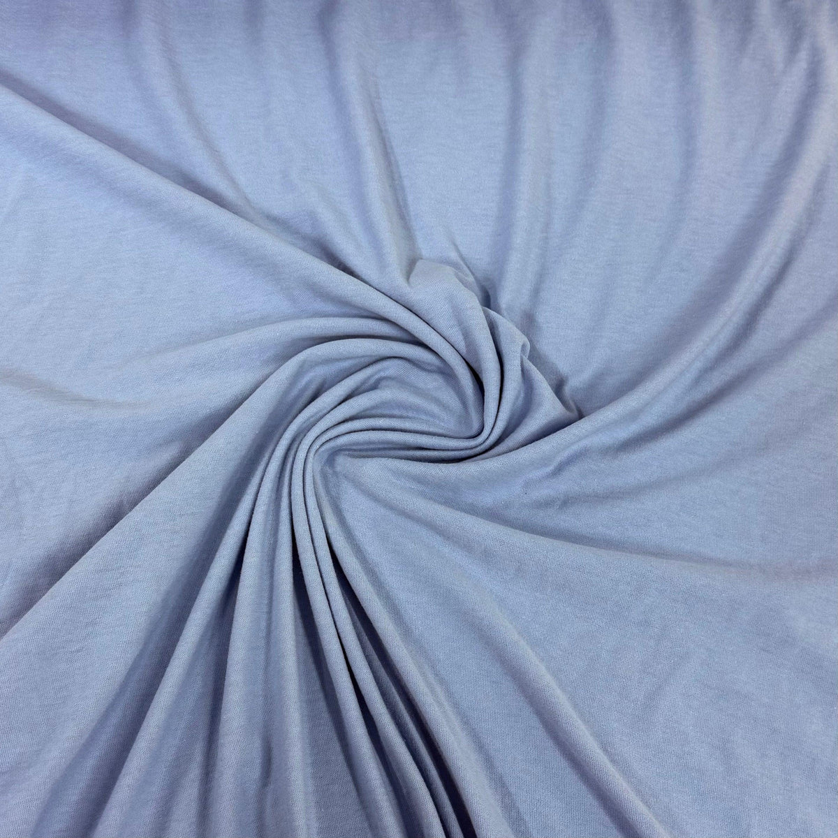 Soft light blue organic cotton fabric swirled for texture, Nature's Fabrics