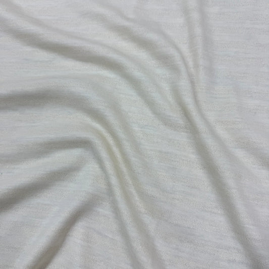 Soft white organic cotton fabric by Nature's Fabrics, ideal for eco-friendly sewing projects