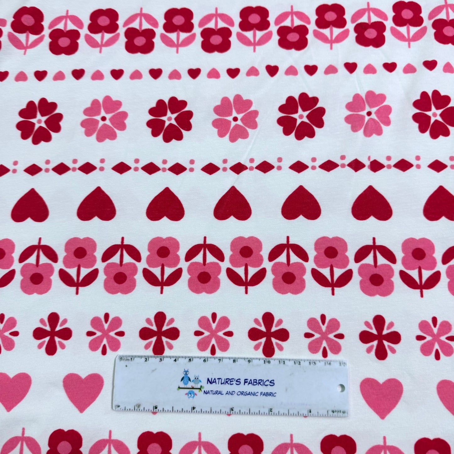 Pink Hearts and Daisies on Off White Bamboo/Spandex Jersey Fabric - Printed in the USA