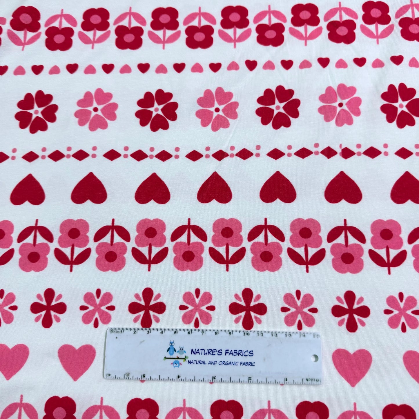 Pink Hearts and Daisies on Off White Bamboo/Spandex Jersey Fabric - Printed in the USA