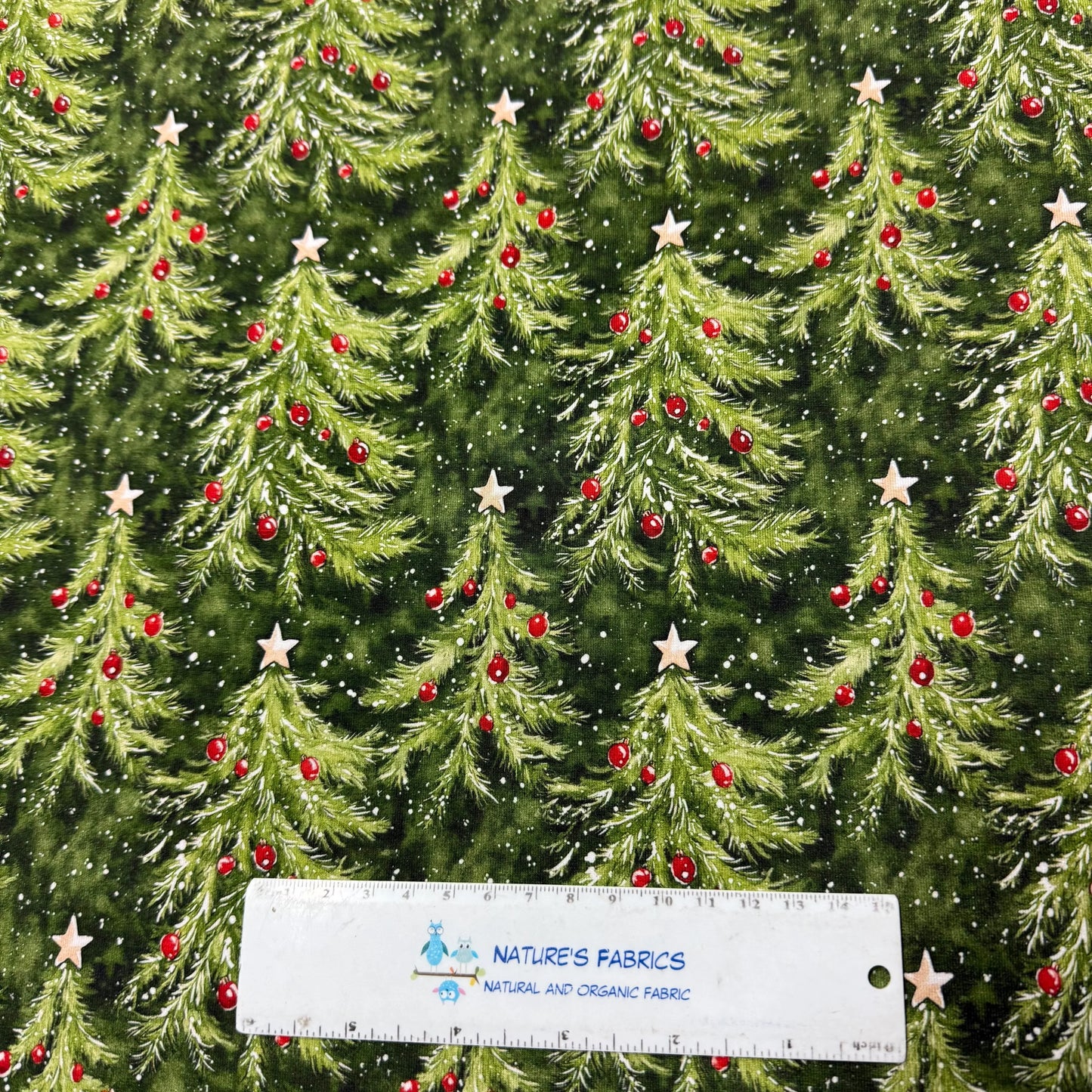 Christmas tree fabric with red ornaments and stars by Nature's Fabrics, natural organic cotton yardage