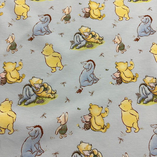 Winnie the Pooh and Friends on Blue Organic Cotton/Spandex Jersey Fabric