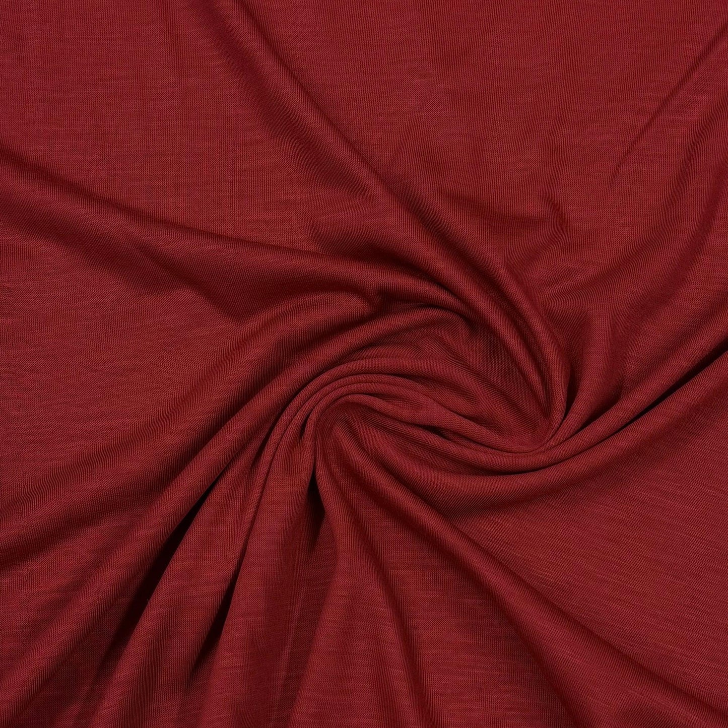 Rich burgundy organic cotton fabric swirled for texture — Nature's Fabrics