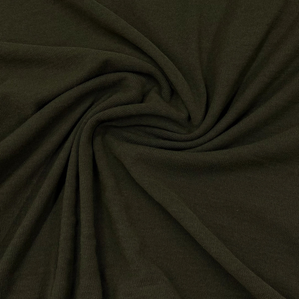 Nature's Fabrics olive green natural fabric draped in a spiral fold