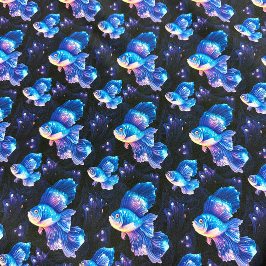 Nature's Fabrics blue betta fish pattern on dark fabric
