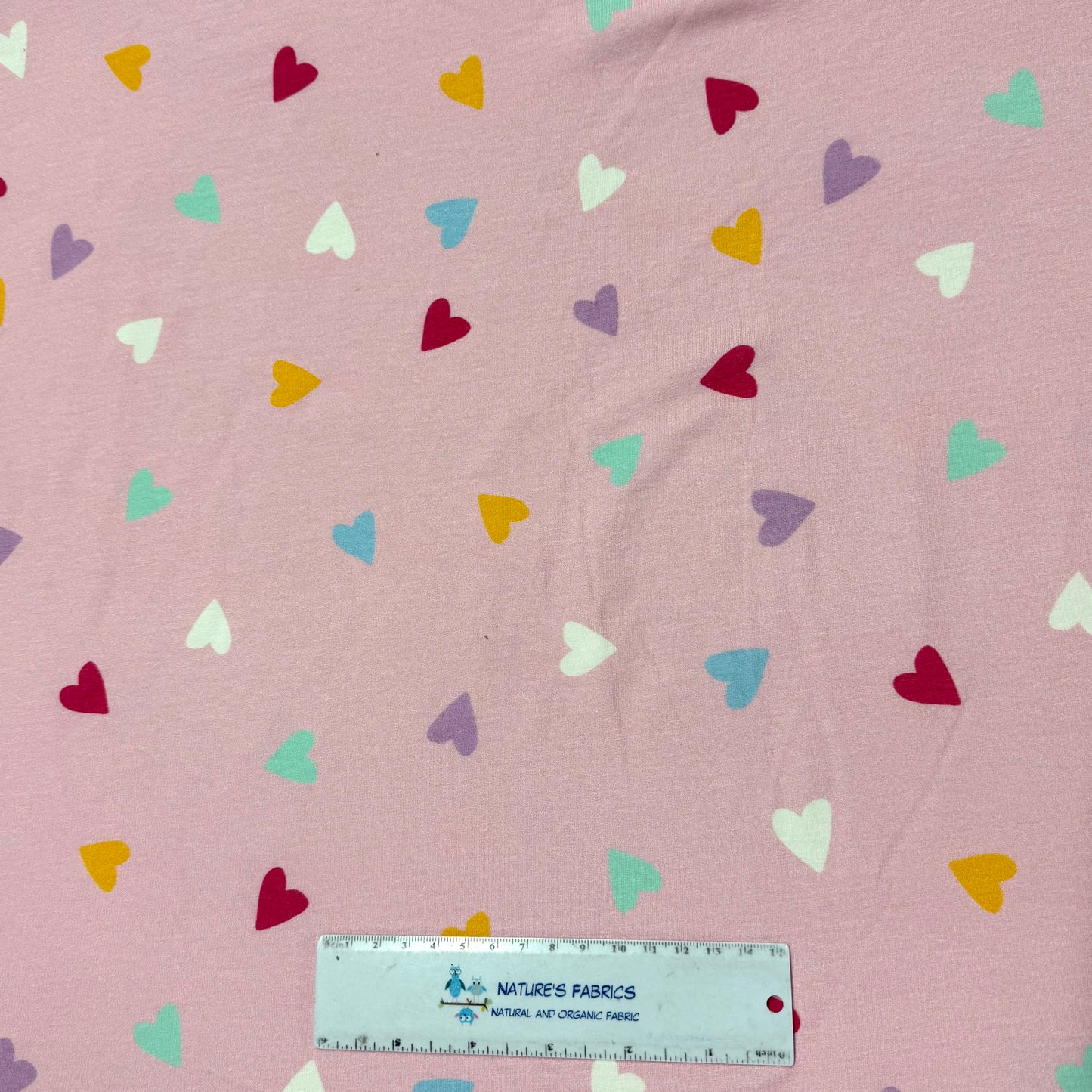 Rainbow Heart Toss on Pink Bamboo/Spandex Jersey Fabric - Printed in the USA