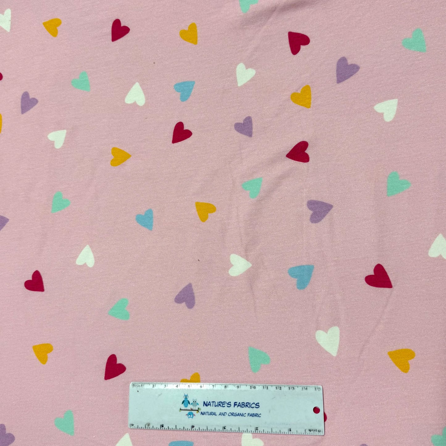Rainbow Heart Toss on Pink Bamboo/Spandex Jersey Fabric - Printed in the USA