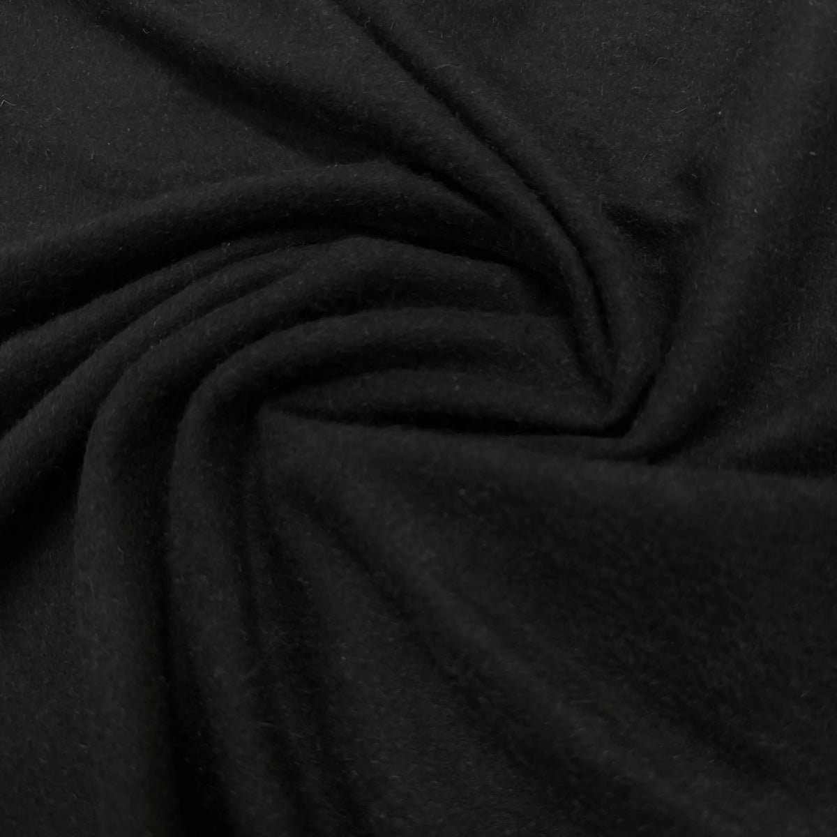 Close-up of draped black natural fabric from Nature's Fabrics