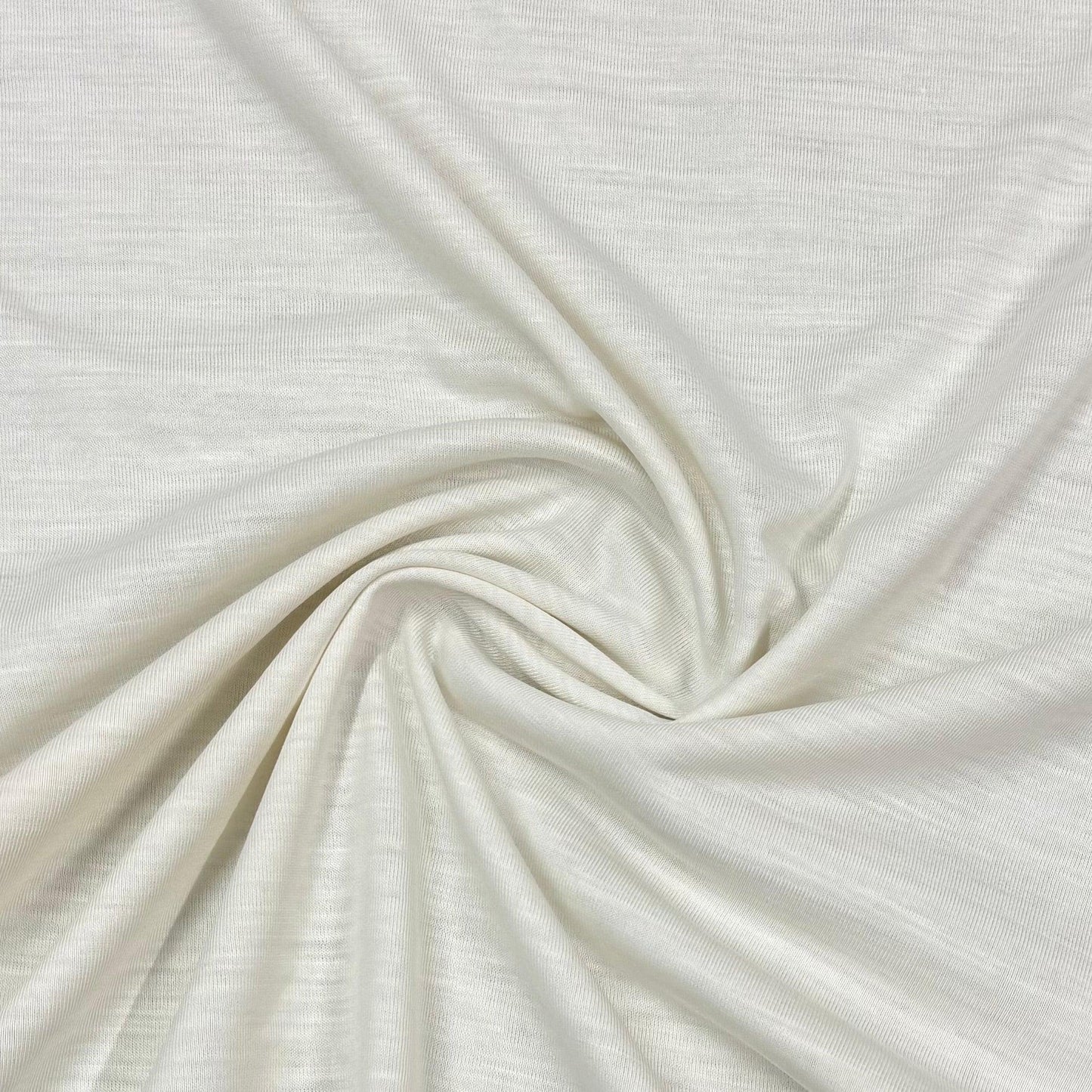 Soft organic cotton fabric swirled in creamy white, Nature's Fabrics