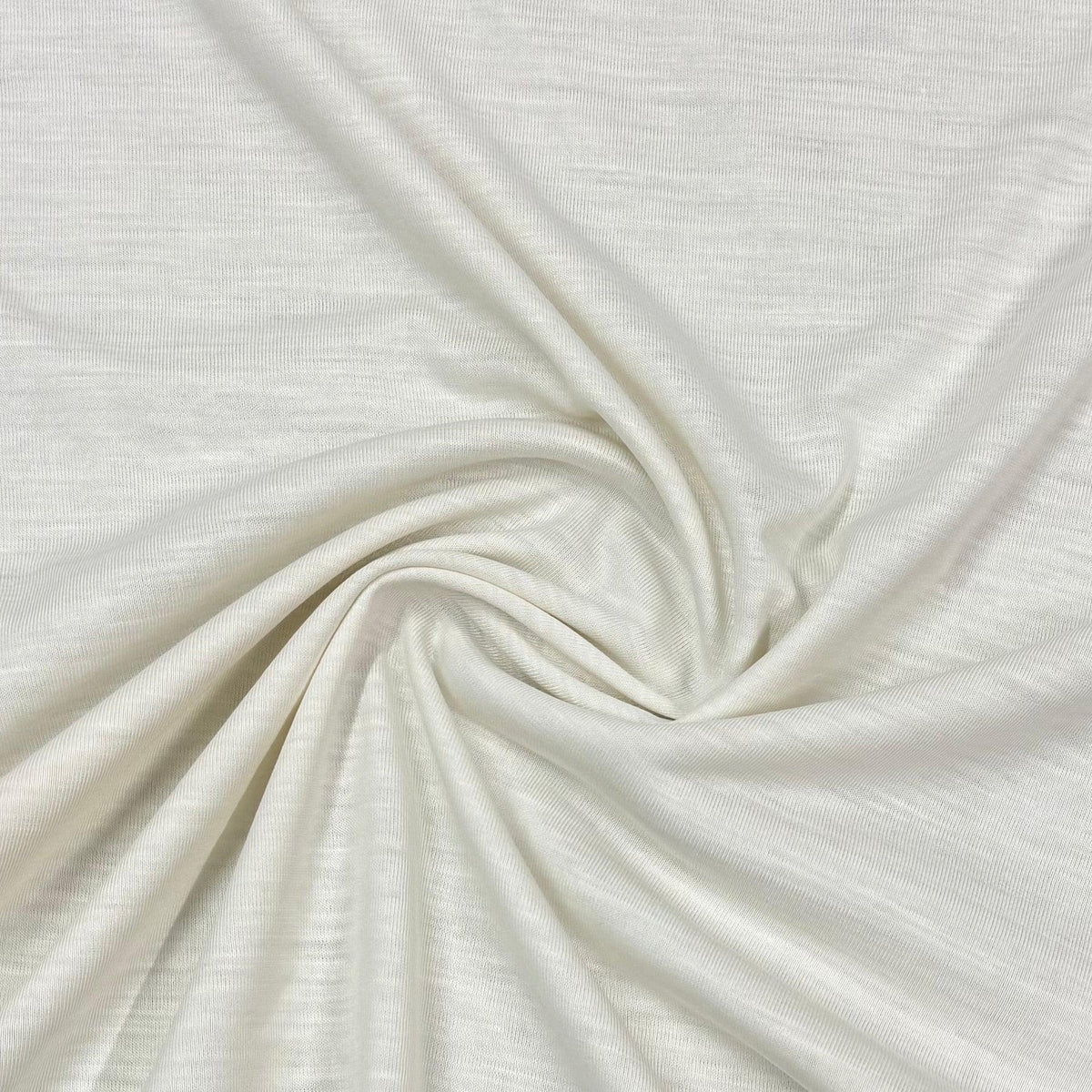 Soft organic cotton fabric swirled in creamy white, Nature's Fabrics
