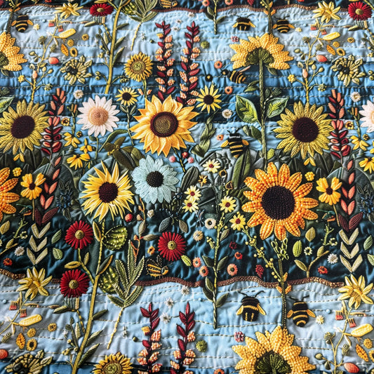 Nature's Fabrics embroidered blue cotton fabric with sunflowers, bees, and floral patterns.