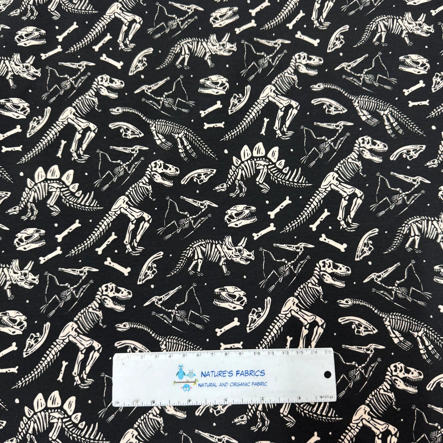 Dino Skeletons on Organic Cotton/Spandex Jersey Fabric