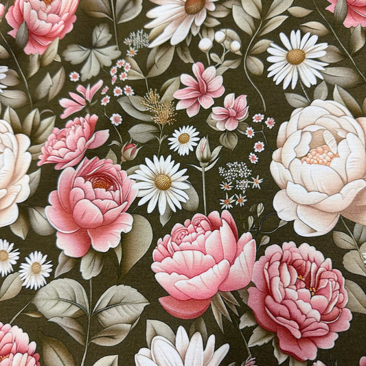 Nature's Fabrics floral print with pink peonies, white daisies, and green leaves on dark background
