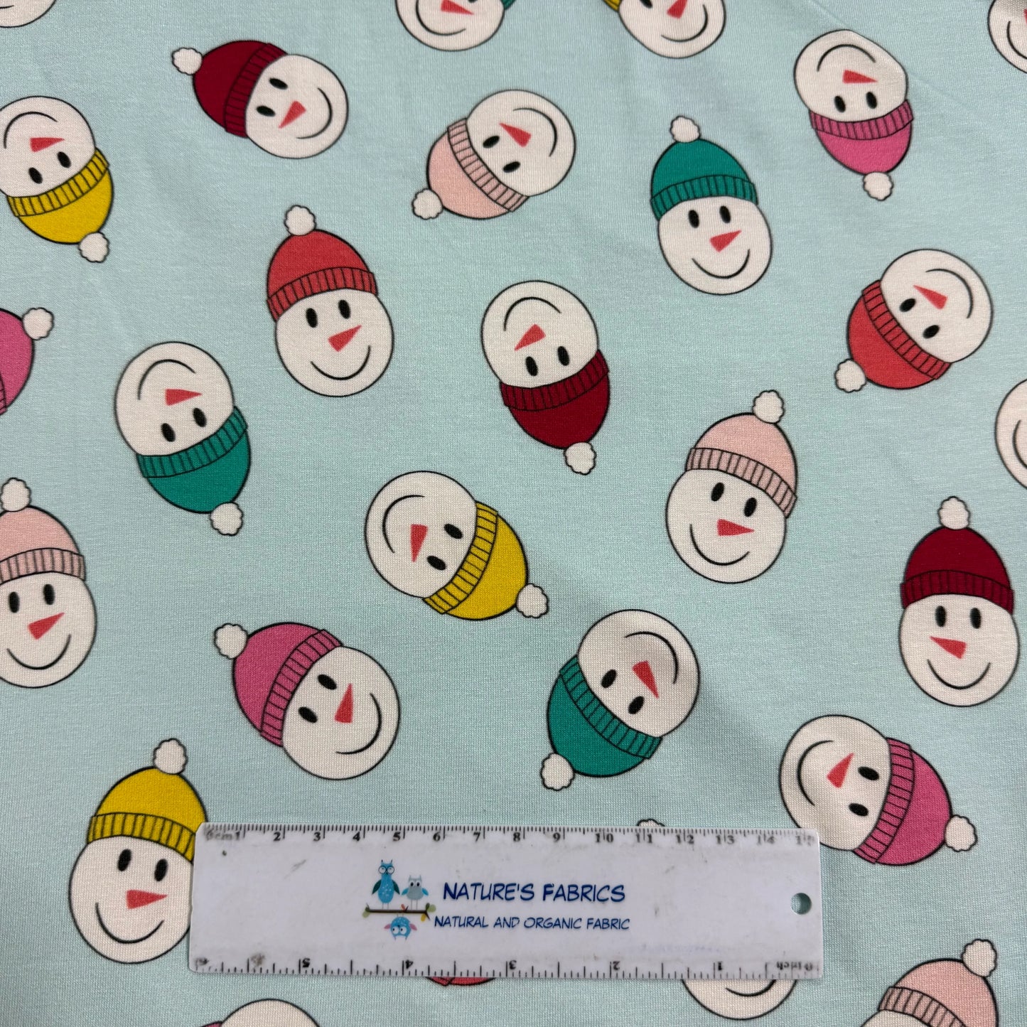 Snowmen in Hats on Blue Bamboo/Spandex Jersey Fabric - Printed in the USA