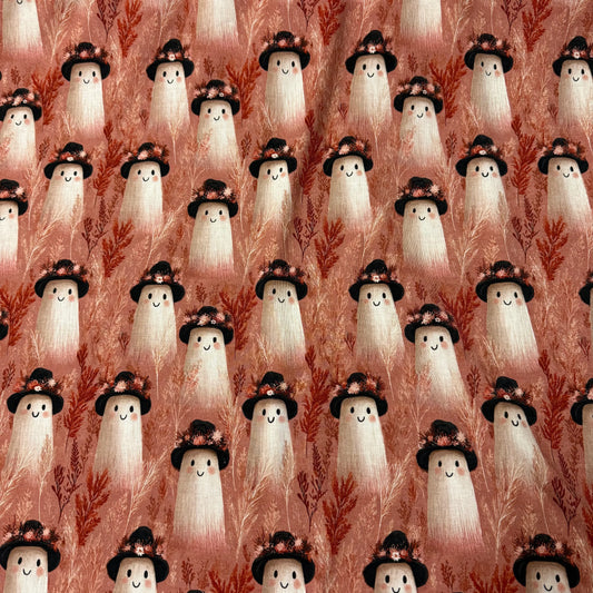 Cute ghost print fabric with witch hats on rust background, Nature's Fabrics