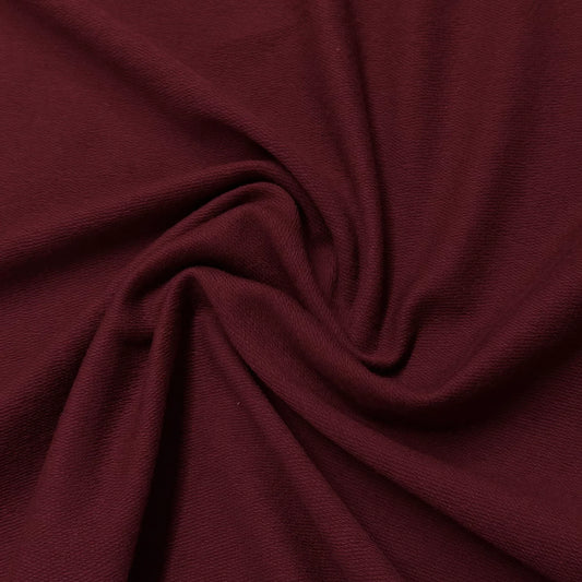 Deep burgundy organic cotton fabric by Nature's Fabrics, soft texture and natural drape