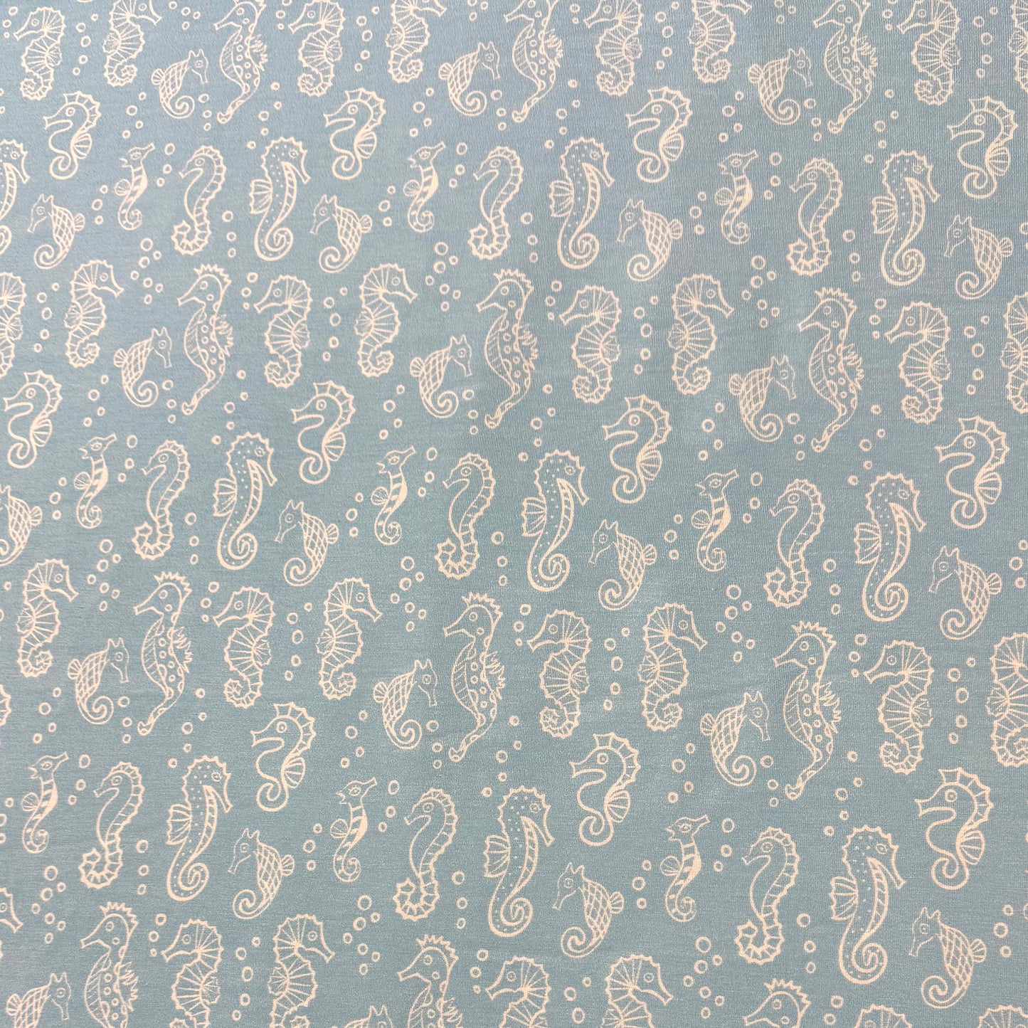 Seahorses on Blue Bamboo/Spandex Jersey Fabric - 200GSM