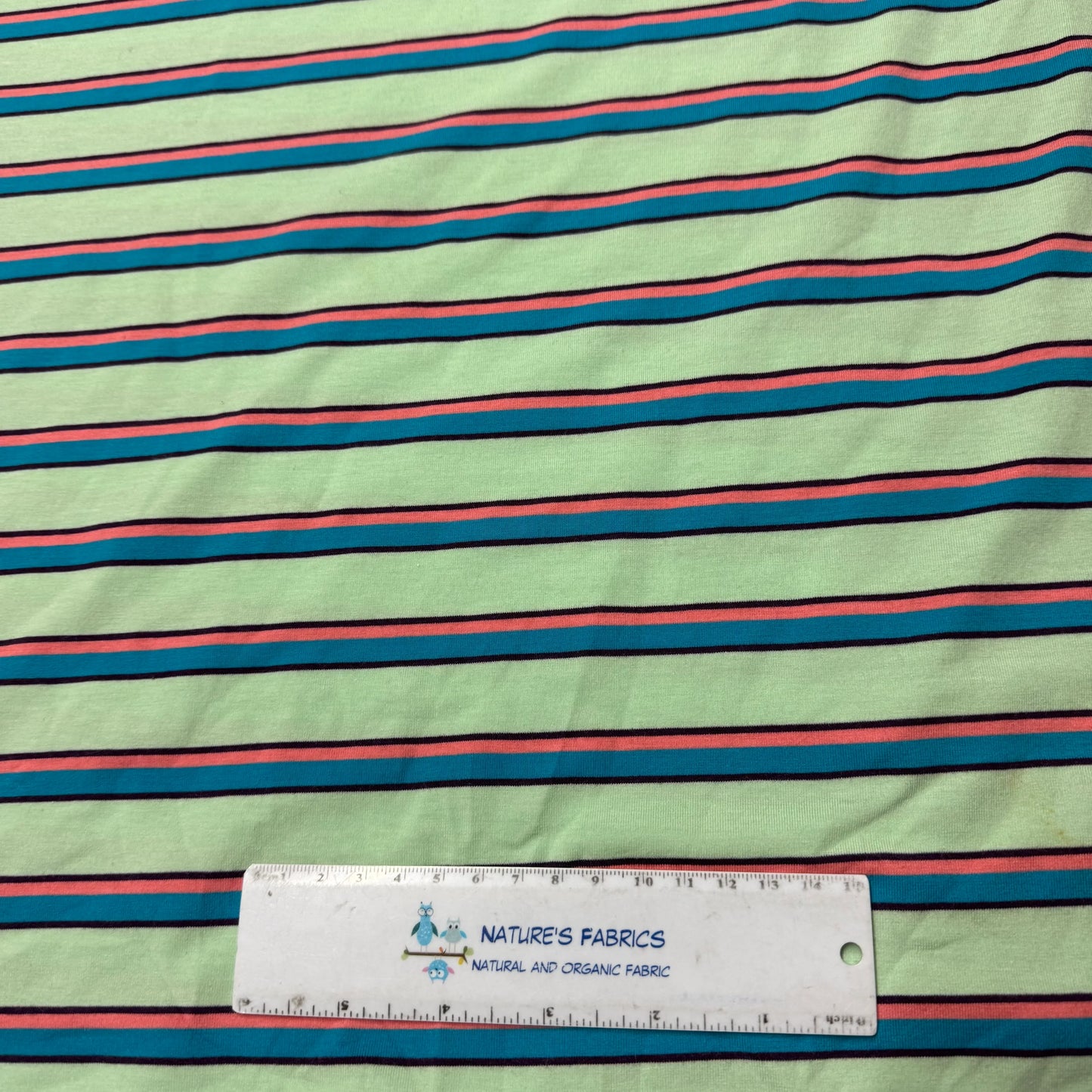 Blue and Peach Stripes on Mint Cotton/Spandex Jersey Fabric