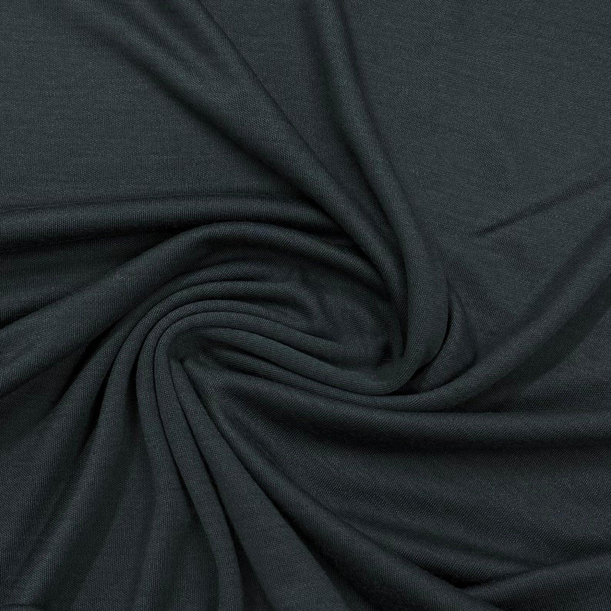 Dark charcoal organic cotton fabric swirled texture by Nature's Fabrics
