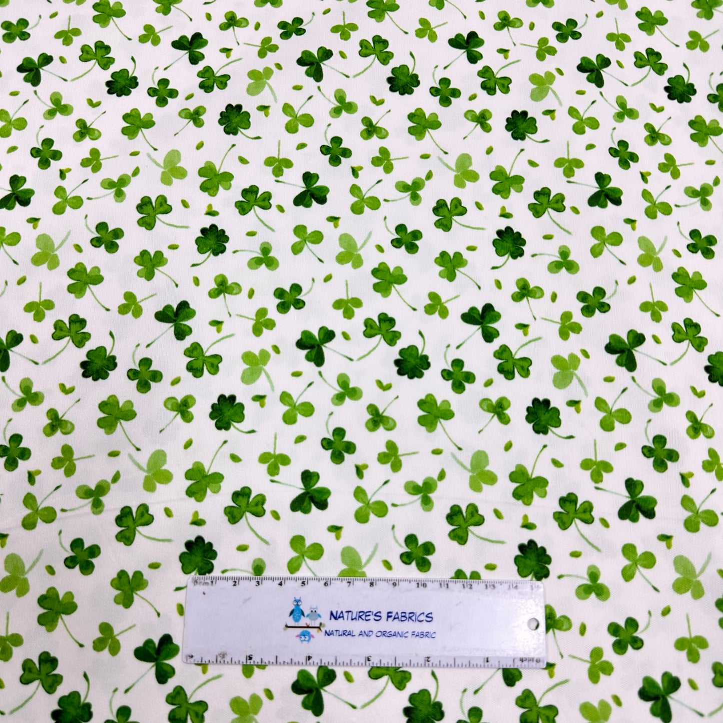 Shamrocks on White 1 mil PUL Fabric- Made in the USA