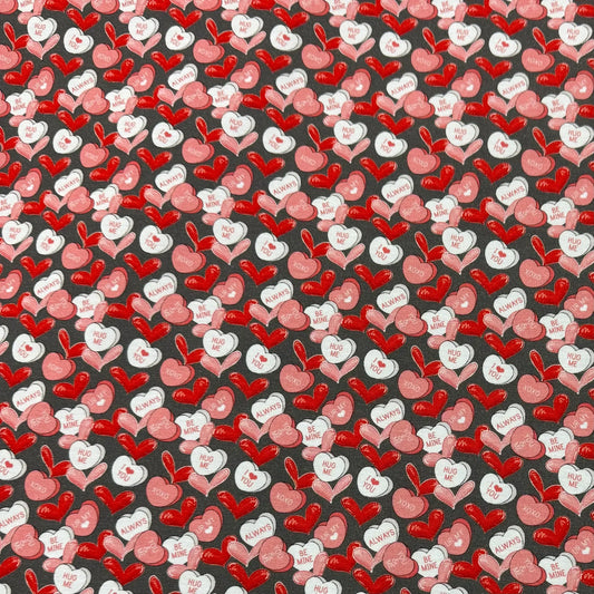 Nature's Fabrics red and pink heart patterned fabric with romantic text
