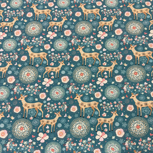 Nature's Fabrics organic cotton fabric with a whimsical deer, floral, and mandala pattern.