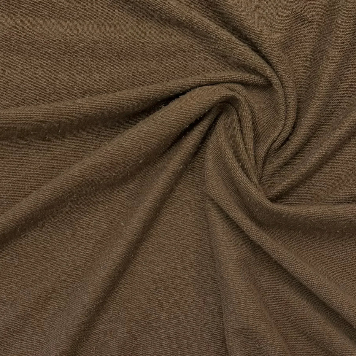 Rich brown organic cotton fabric swirled texture by Nature's Fabrics