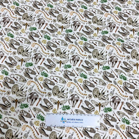 Nature's Fabrics organic cotton fabric with a vintage nature print of insects and botanical elements.