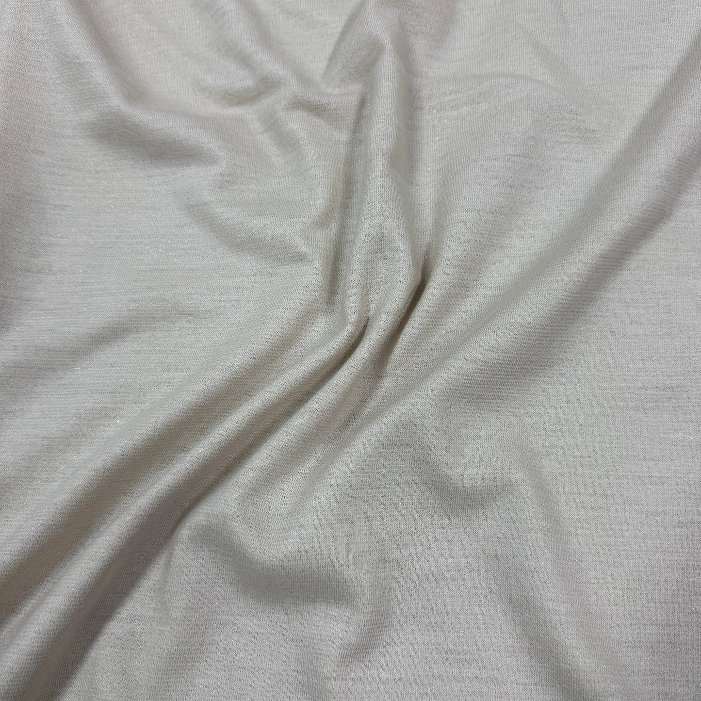 Soft, lightweight natural fabric with subtle shimmer, ideal for eco-friendly sewing projects by Nature's Fabrics